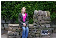 Helen on stone seat